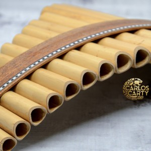 Carmen plays the funny pan flute